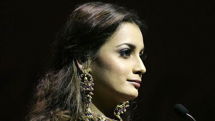 Dia Mirza Wearing Jewellery And Side Face Front Of Mic